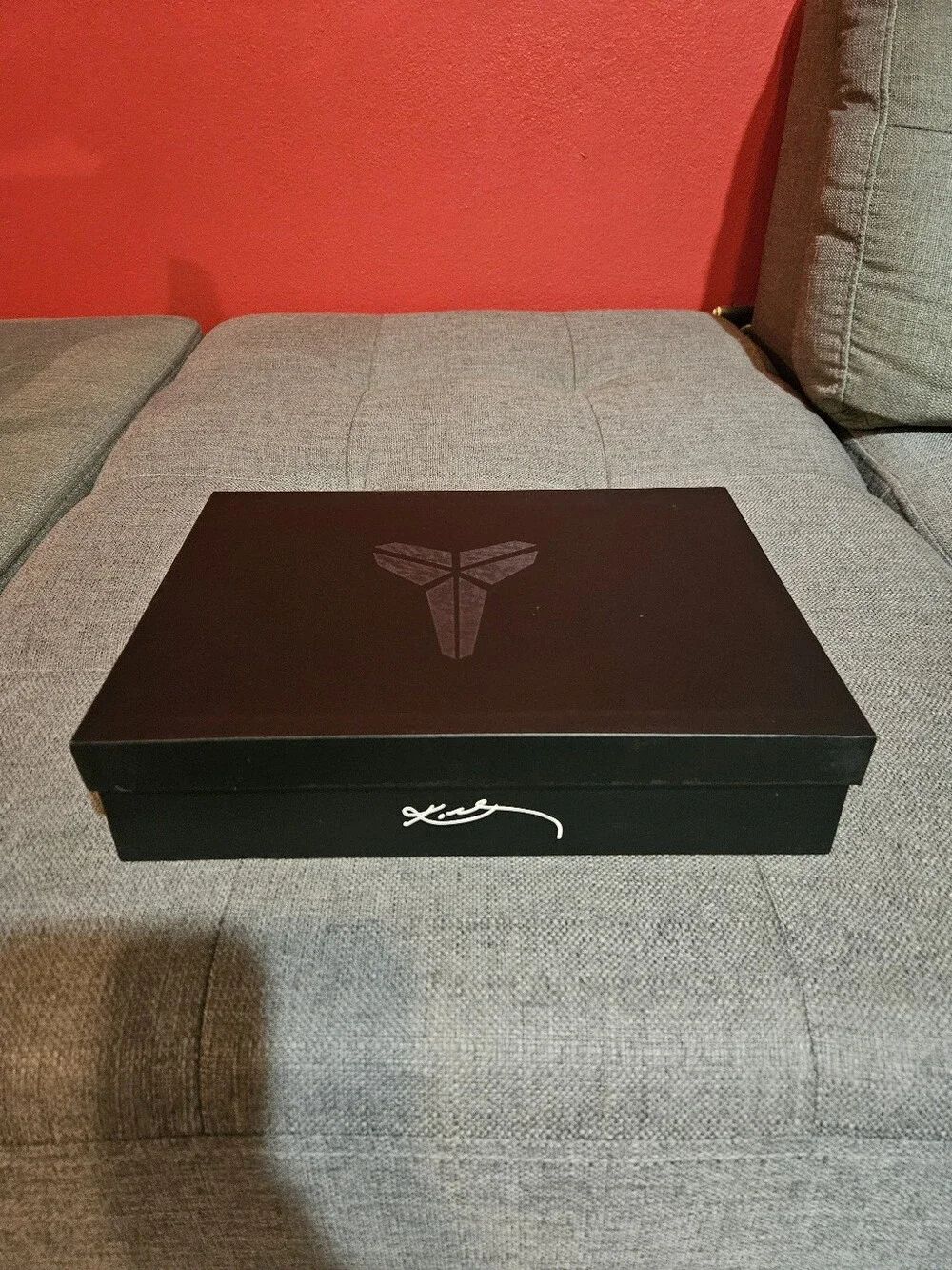Kobe Black Mamba storage case with 12 mini sneakers included.